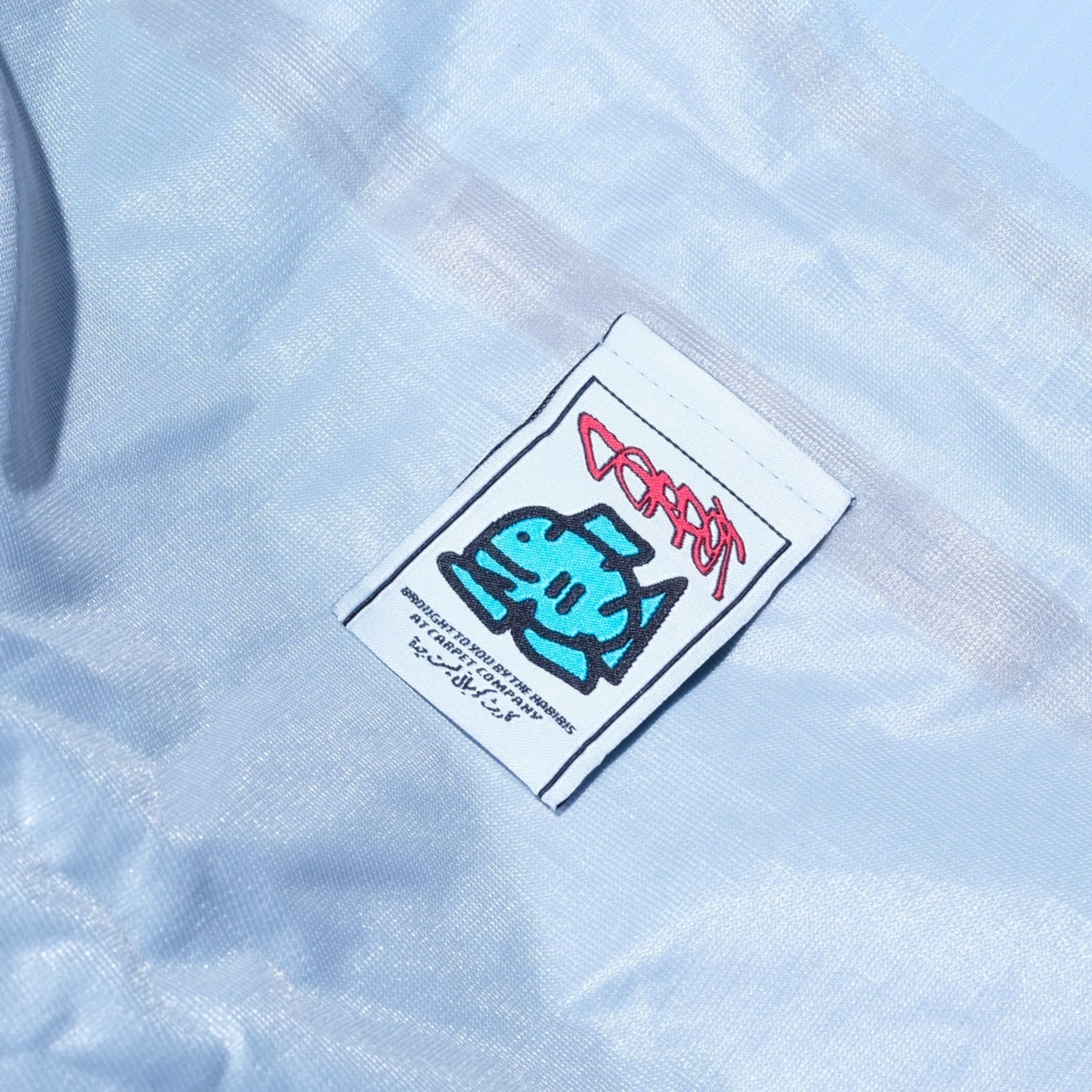 CARPET Bookbag Rain Jacket