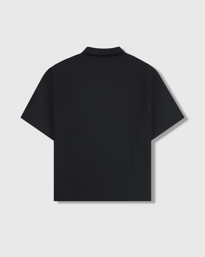 PLEASURES Electron Zip Polo