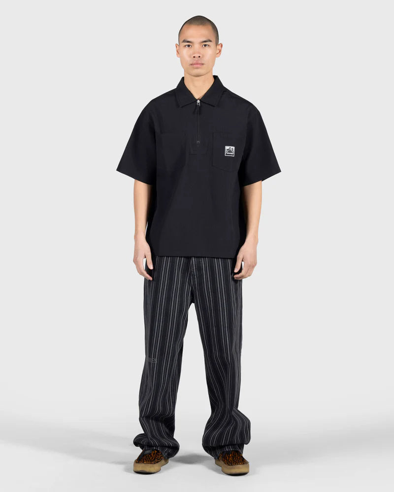 PLEASURES Electron Zip Polo