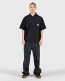 PLEASURES Electron Zip Polo